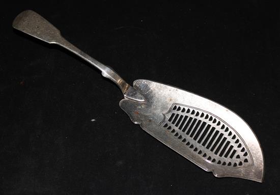 A George IV Scottish silver fiddle pattern fish slice by Peter Aitken I, Glasgow, 1828.
